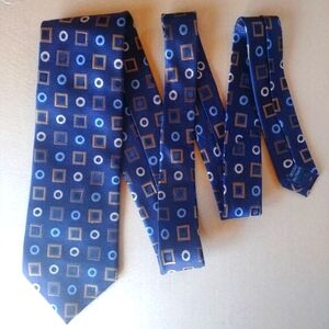 Montebello Italia 100% silk tie blue with brown geometric pattern